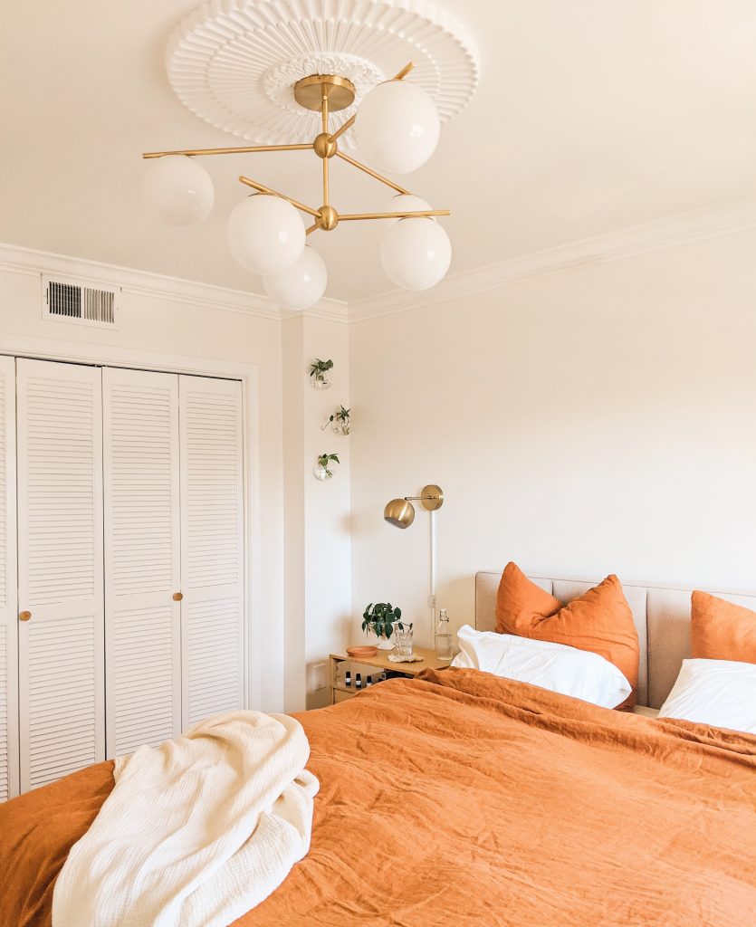 The Radiant Abode Home Tour: Master Bedroom full view with West Elm chandelier