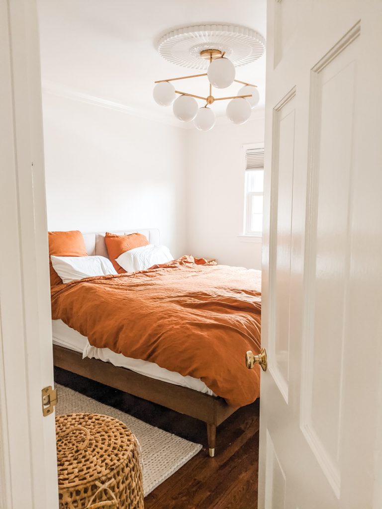 The Radiant Abode Home Tour: Master Bedroom hallway view with chandelier